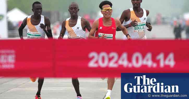 Beijing half marathon winner thrown out after trio slowed to let him win