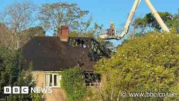 Crews remain at scene of early hours house fire