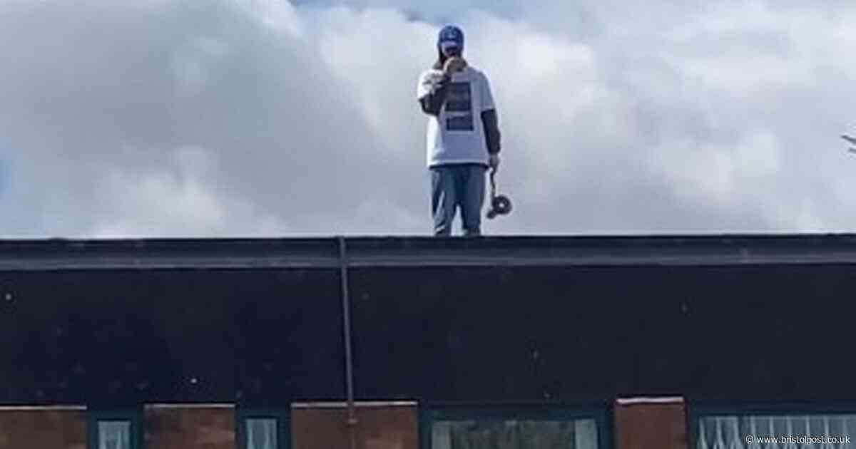 Rooftop standoff with police in Bristol suburb
