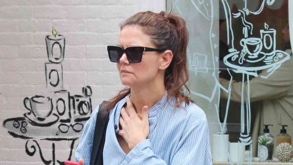 Katie Holmes cuts a casual figure as she steps out into New York City after her daughter Suri Cruise's 18th birthday