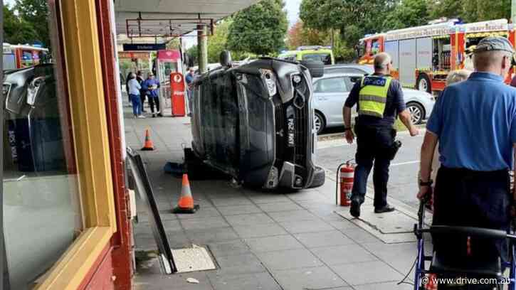 Driver rolls car onto footpath in Melbourne
