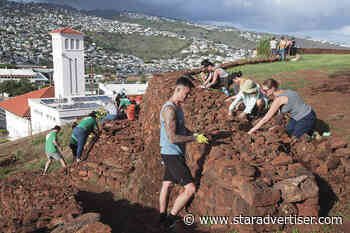 Volunteers care for the land in honor of Earth Day