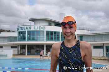 Brighton GP completes run and swim for Uganda health charity