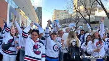 Thousands of Jets fan show up for their team as downtown Winnipeg enters total whiteout conditions