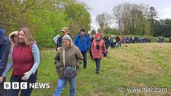 Villagers walk in protest over 2,000-homes plan