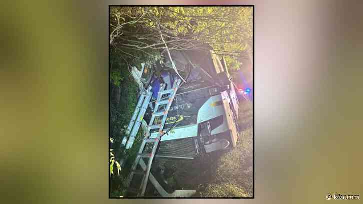 Bus with over 50 passengers crashes into trees off Virginia highway; driver charged 