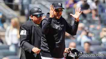 Yankees' Aaron Boone ejected for fan's heckling of MLB umpire in bizarre sequence: 'I don't care who said it'