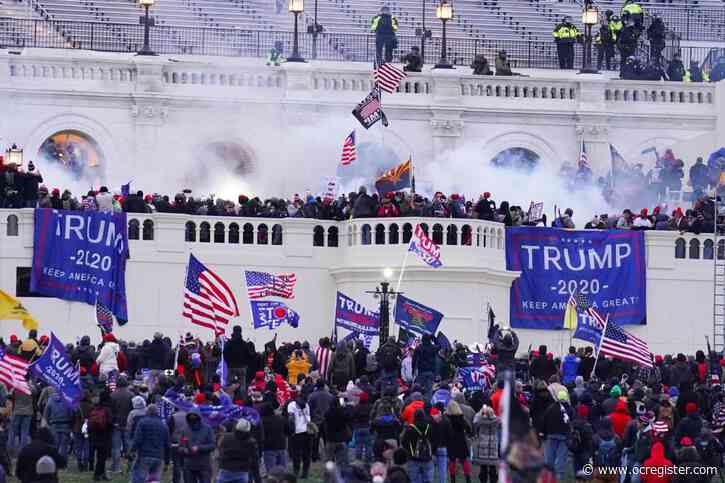 Man who attacked police after storming Capitol with Confederate flag gets over 2 years in prison