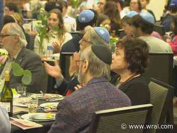 'Passover is significant': Hundreds gather for seder dinner in Carrboro as FBI warns of uptick in violence against Jewish people