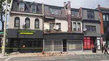 A derelict building's facade crumbled 1.5 years ago in Hamilton. The city has yet to demolish it