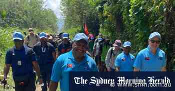 Selfies, snacks and ceremonies: Albanese sets up camp for night on Kokoda Track
