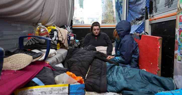 Homeless couple move into bus stop after refusing to be separated by council