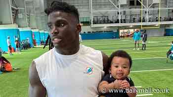 NFL star Tyreek Hill hints he has TEN kids in new interview and insists he takes care of them all - but the $120m Miami Dolphins man, 30, admits it's distraction when they go to see him play football!