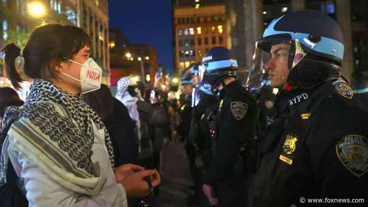 NYC riots: Anti-Israel agitators hurl bottles at NYPD, form human chain amid mass arrests