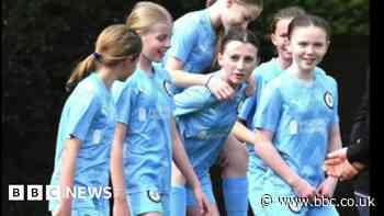 Girls' football team defeat boys to win league