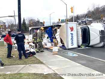 Kingsway lanes closed due to truck rollover