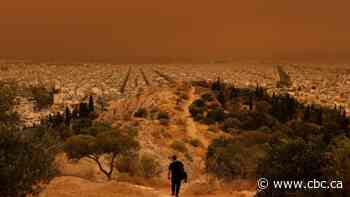 Eerie, orange skies engulf Athens as dust clouds blow in from Africa