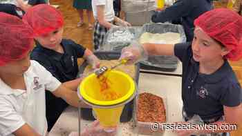 Elementary students pack 12,500 meals for Haiti