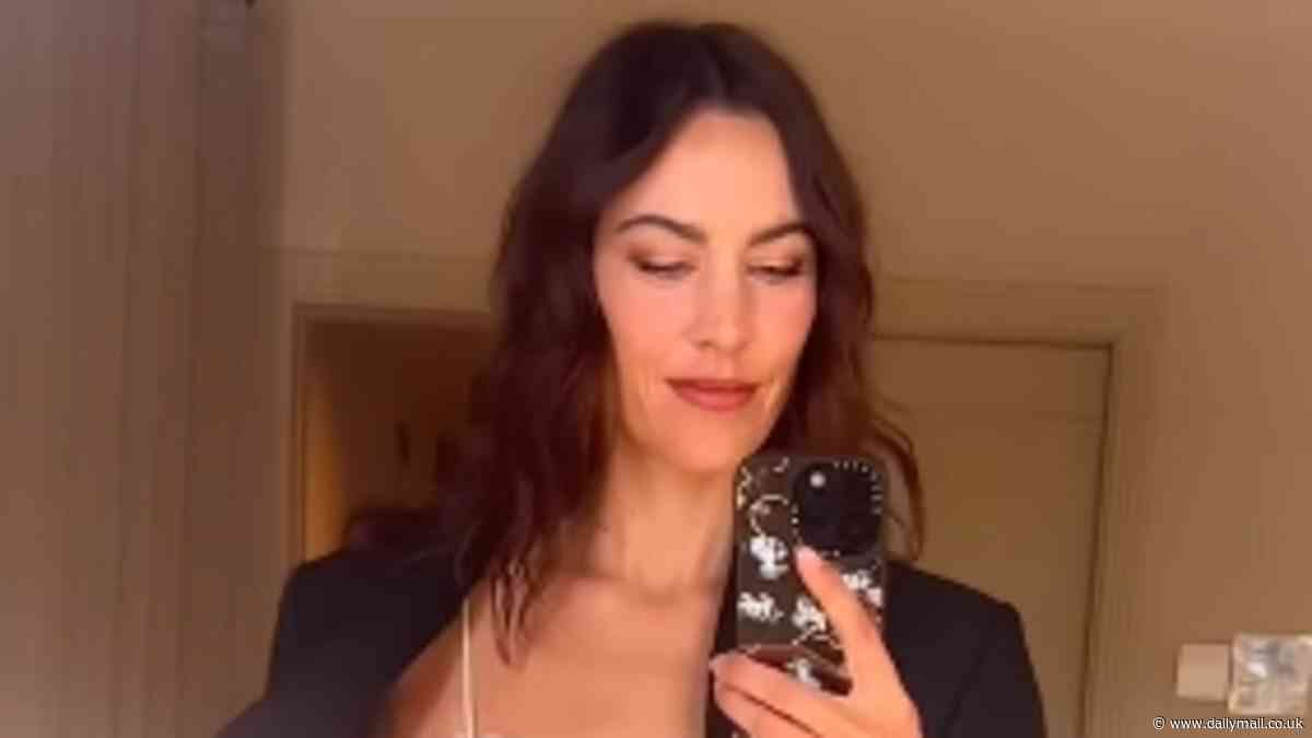 Alexa Chung puts on a leggy display in a sexy silk co-ord as she joins models Adwoa Aboah and Emily Ratajkowski at Victoria Beckham's Mango launch event in Spain to celebrate her first foray onto the high street