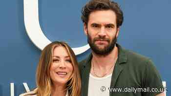 Kaley Cuoco poses up with her steamy Based On A True Story leading man Tom Bateman at star-studded NBC Universal Emmys Press Luncheon