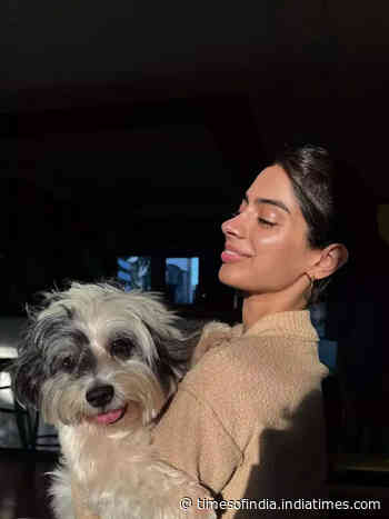 Khushi's sun-kissed moments with her pet