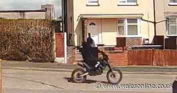A mystery biker in a balaclava and ski goggles has been terrorising Welsh villages