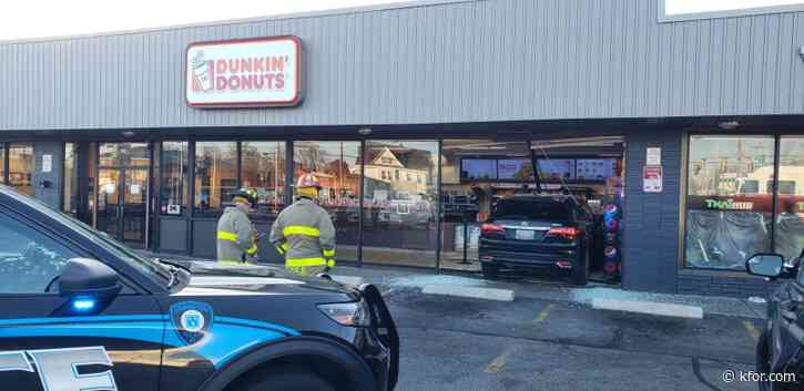Son of Dunkin' worker has perfect response after car crashes into coffee shop