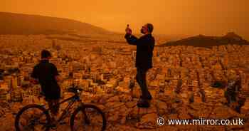 Skies turn orange as Saharan dust clouds descend blanketing major city