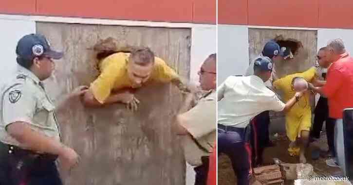 Escaping prisoners tunneling out of jail are met by waiting police officers