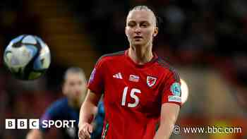 Wales forward Hughes suffers serious knee injury
