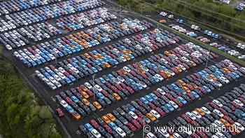 China floods Britain with electric cars: Stunning images show thousands that arrived in UK on just one ship amid fears that Beijing could use them to spy on Brits