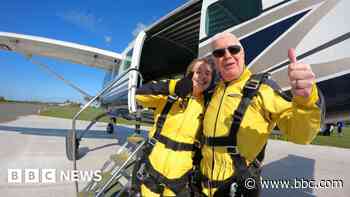 Teenager and her grandfather enjoy charity skydive