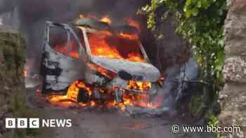 Van destroyed after catching fire in Devon