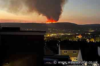 Huge fire breaks out on Welsh hillside with flames visible from miles away