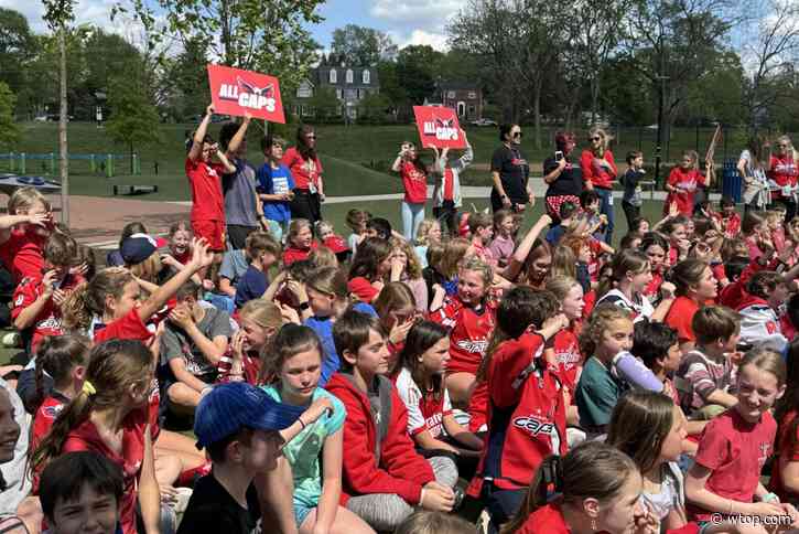Arlington elementary schoolers cheer on the Washington Capitals during playoff pep rally