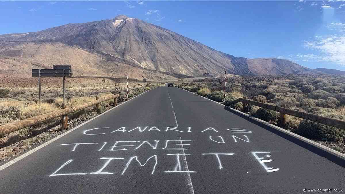 'The Canary Islands have a limit': Latest anti-tourist graffiti appears beneath Tenerife's iconic Teide volcano after official told Brits looking for cheap holidays to go elsewhere