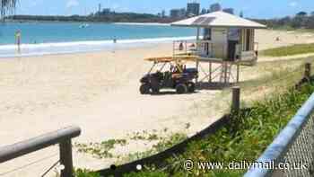 Mooloolaba Spit beach: Anzac Day horror as man is left fighting for life after being pulled from the water unconscious at a popular beach on the Sunshine Coast
