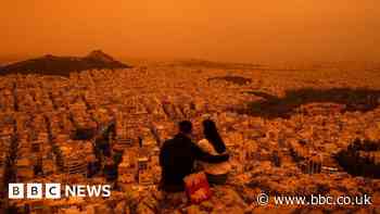 Orange Sahara dust haze descends over Athens