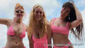 Rumer Willis and sisters display beach bodies in matching pink swimwear during tropical getaway
