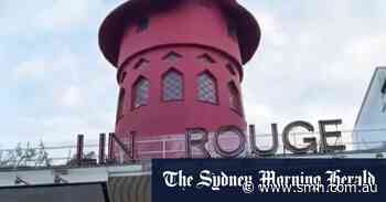 Moulin Rouge windmill falls off