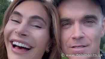 Ayda Field breaks down in tears while discussing husband Robbie Williams' documentary and admits seeing his 'deep pain' was 'so upsetting'
