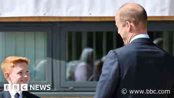 Prince William visits school after boy's invite