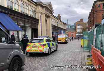 Bolton Police  in town centre as they looked for 'missing kids'