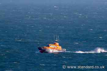 Three men rescued by coastguard after tanker and fishing boat collide at sea