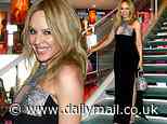 Kylie Minogue plays peekaboo in sparkling black dress as she's honored at the TIME 100 Gala in NYC