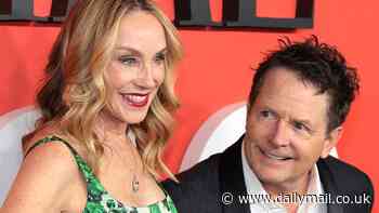Michael J. Fox gazes adoringly at wife Tracy Pollan on red carpet before being honored at Time 100 Gala