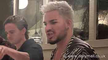No VIP treatment here! Adam Lambert appears flustered as he is forced to play musical chairs at one of Justin Hemmes' restaurants in Sydney to make room for other diners
