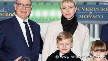 Princess Charlene wows in knee-high boots for rare outing with twins