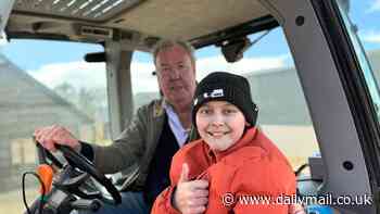 Jeremy Clarkson helps make young cancer patient's dreams come true as 12-year-old boy battling rare disease rides Lamborghini tractor and holds the Stig's helmet at Diddly Squat