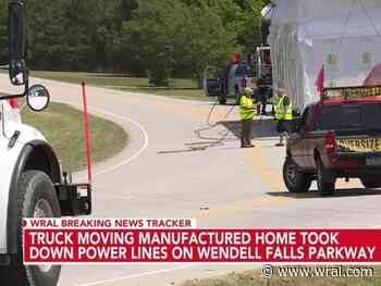 Too tall: House on flatbed truck brings down powerlines, closing Wendell Falls Parkway